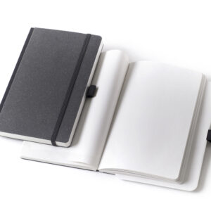 Mecum Draft notebook in Ricuoio® and recycled paper, fabric spine, superflat opening.
