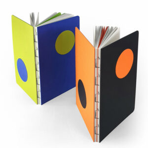 DOT double-sided notebook with dual ruling in cardstock and recycled paper, superflat opening.