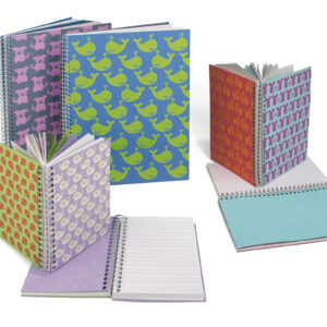 Pups double-sided spiral notebook with dual ruling in straw paper and recycled paper.